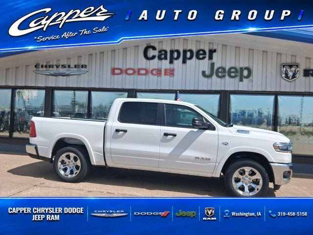 2026 RAM Ram 1500 RAM 1500 BIG HORN CREW CAB 4X4 5'7' BOX in Bright White Clear-Coat Exterior Paint — front three-quarter view